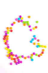 Gourmet chocolate candy assortment laid out on slate background