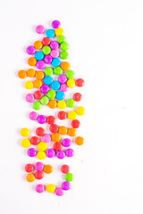 Gourmet chocolate candy assortment laid out on slate background