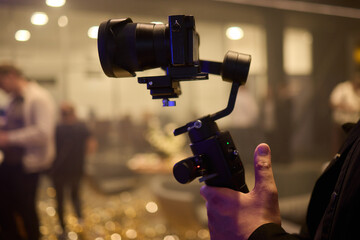 Fototapeta premium A Professional Camera Stabilizer utilized at a thriving Event setting for capturing stunning visuals