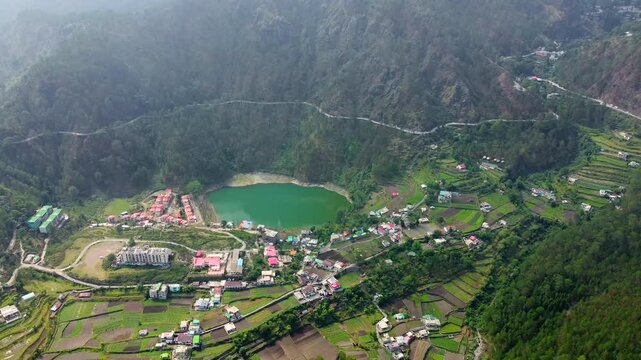 Aerial view of khurpatal lake in smanora range. A beautiful image of khurpatal lake and houses in uttarakhand in India.