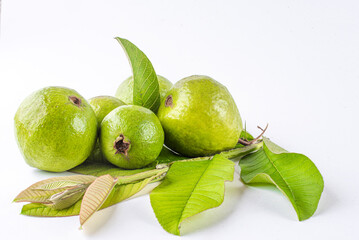 White background with guava leaves providing ample copy space image.