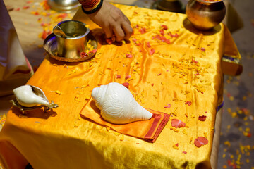Top view Objects of Aarti ceremony used by Pujaris on Ganges on golden table