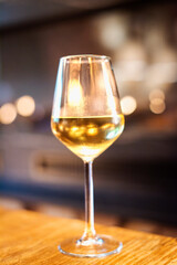 Glass of white sparkilng wine.