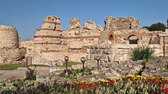 Ancient ruins of Nessebar, weathered brick and stone walls remnants of Byzantine fortress structure. Thracian settlement Mesembria now the old town of Nesebar, UNESCO world heritage in Bulgaria