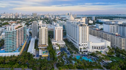 Obraz premium Beach front of art deco hotels and condos at sunrise. Miami Beach, Miami, Florida, United States.