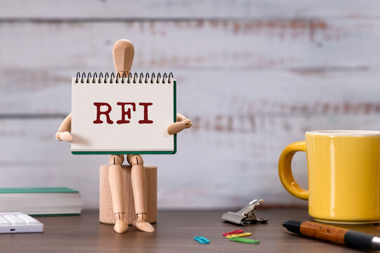 There is notebook with the word RFI. It is an abbreviation for Request For Information as eye-catching image.