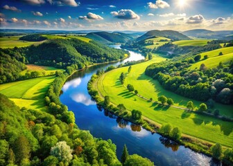 Obraz premium Serene Nature Landscape with Lush Green Hills, Clear Blue Sky, and Gentle Flowing River in Summer