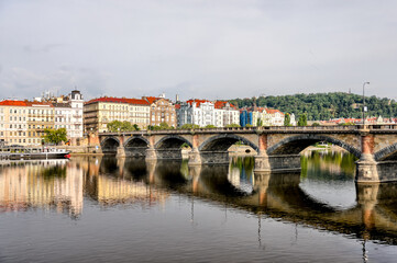 Obraz premium Prague, Czech Republic - July 19, 2024: Morning views along the Vltava River in Prague in the Czech Republic 