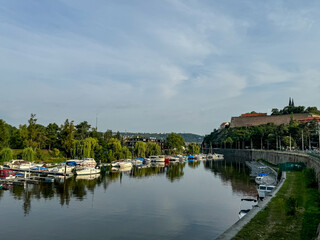 Obraz premium Prague, Czech Republic - July 19, 2024: Morning views of modern office towers and residential buildings on the outskirts of Prague in the Czech Republic