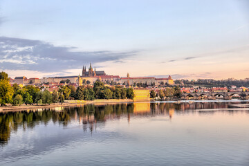 Prague, Czech Republic - July 19, 2024: Early morning views of the Vltava River and the Charles Bridge in Prague in the Czech Republic

