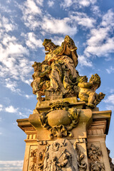 Prague, Czech Republic - July 19, 2024: Statues of Saint Ludmila along the Charles Bridge in Prague in the Czech Republic
