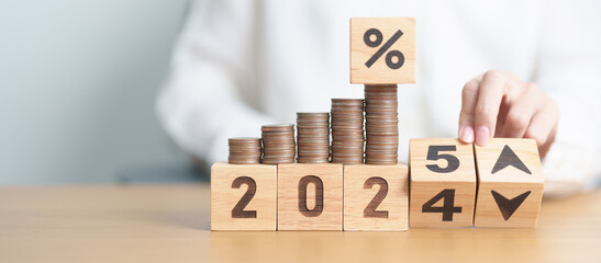 2024 to 2025 New year with percentage change to UP and Down arrow with coin stack. Interest rate, GDP, stocks market, financial, deflation and Inflation, mortgage, debt, Loan and Economic Recession