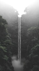 Misty Waterfall Surrounded by Lush Greenery