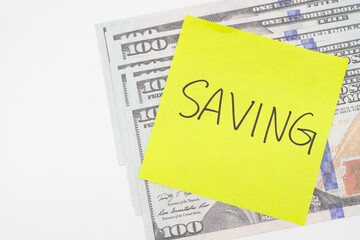 Saving text on sticky note with US Dollar. Money saving concept. planning budget and saving money for future. Financial Planning.