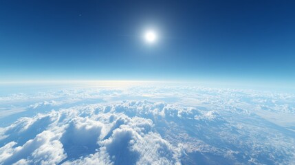 Above the clouds, with a rich blue sky