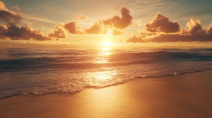 Obraz premium Sunset over a serene beach, golden light shimmering on the water and sand
