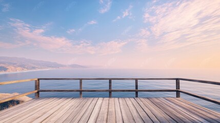 Obraz premium A wooden viewing deck facing a vast ocean, with the shoreline and distant hills only visible on the sides