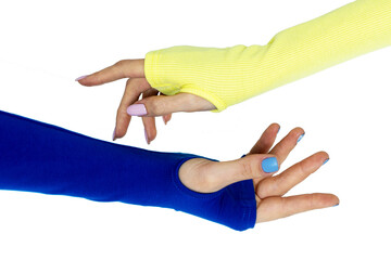 Intertwined hands with blue and yellow sleeves, concept of freedom of Ukraine