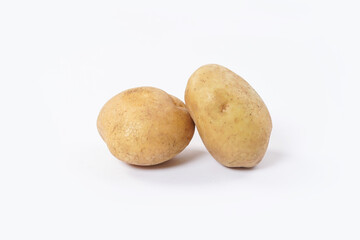 Washed potatoes, organic potato isolated on white background. Young potatoes. Peel potatoes.Harvesting collection. organic, freshly dug potatoes. Vegan. Vegetables.Potato slices.