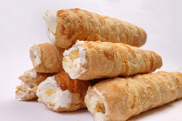 Bangladesh Indian cone shaped hard flaky puff pastry stuffed cream roll