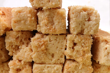 Traditional Indian Milk Cake Alwar Ka Mawa dry flaky biscuit like sweet treat