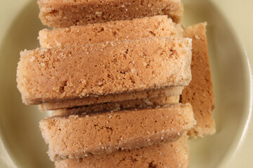 Traditional Indian Milk Cake Alwar Ka Mawa dry flaky biscuit like sweet treat