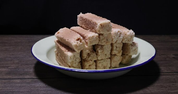 Traditional Indian Milk Cake Alwar Ka Mawa dry flaky biscuit like sweet treat