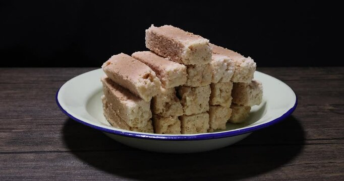 Traditional Indian Milk Cake Alwar Ka Mawa dry flaky biscuit like sweet treat