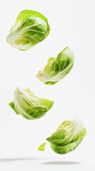 Obraz premium Floating Lettuce Leaves on White Background Generative AI