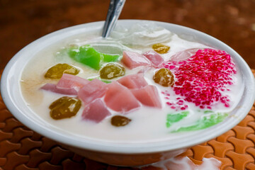 Selendang Mayang Ice. Traditional Desert From Jakarta. Rice flour Pudding served with Coconut Milk and Sweet Syrup