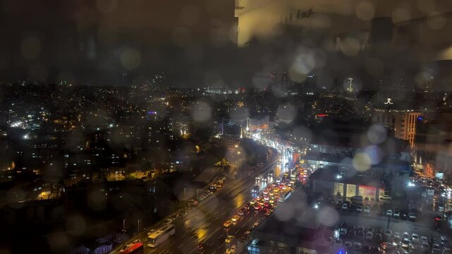 Busy street in Istanbul city at rainy night