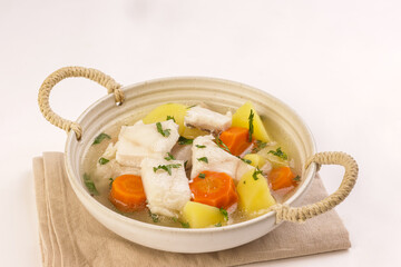 Ukha is Russian Fish Soup, With Potato and Carrot. 