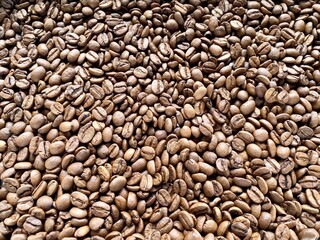 Close up roasted coffee beans background