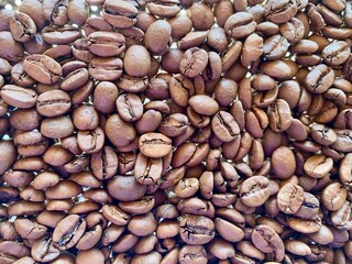 Close up roasted coffee beans background
