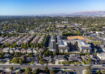 Aerial view of a suburban neighborhood in Silicon Valley with a mix of single family residential...