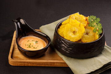 Patacon or Tostones is Fried and Flattened of Green Plantain.