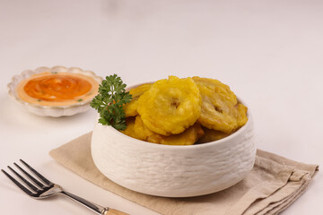 Patacon or Tostones is Fried and Flattened of Green Plantain.