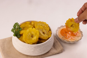 Patacon or Tostones is Fried and Flattened of Green Plantain.