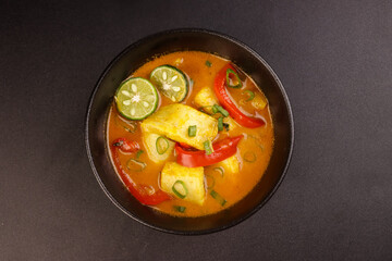 Moqueca is Brazilian Fish Stew With Coconut Milk and Tomato. 