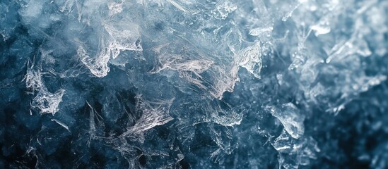 Obraz premium Abstract blue background of ice crystals.