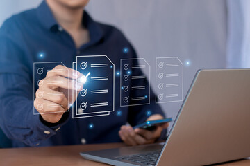 Electronic document review on virtual screens Businessman checks electronic documents, borderless...