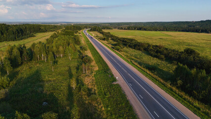Cars are driving on the road