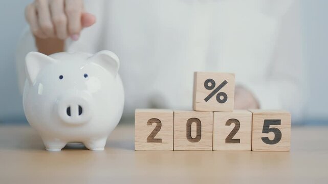 2025 New year with percentage with piggy. Interest rate, GDP, stocks market, financial, deflation and Inflation, mortgage, debt, Loan and Economic Recession