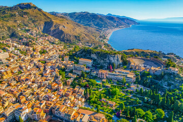 Fototapeta premium Aerial view of the Ancient theater of Taormina with Mount Etna in the background, Sicily, Italy