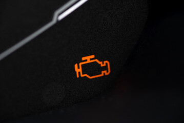 Interior of a modern car and a Check Engine warning light