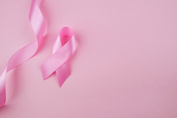 Breast cancer awareness pink ribbon. Pink symbol of October. Disease prevention month banner concept.