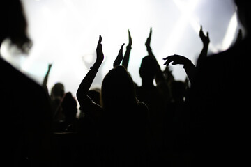 Fototapeta premium Crowd at concert and colorful stage lights.