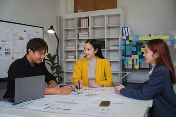 Business Brainstorm: A diverse team of professionals collaborates on a project,  surrounded by visual aids and brainstorming notes,  reflecting a dynamic and creative work environment. 