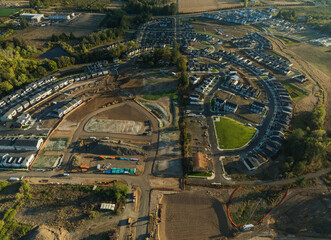 A view of a residential area with houses and a construction site