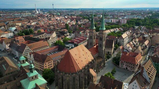 4K Aerial Drone Video of the Twin Spiers and Stained Glass Windows of the Beautiful St. Sebald Church in Downtown Nurnberg, Germany